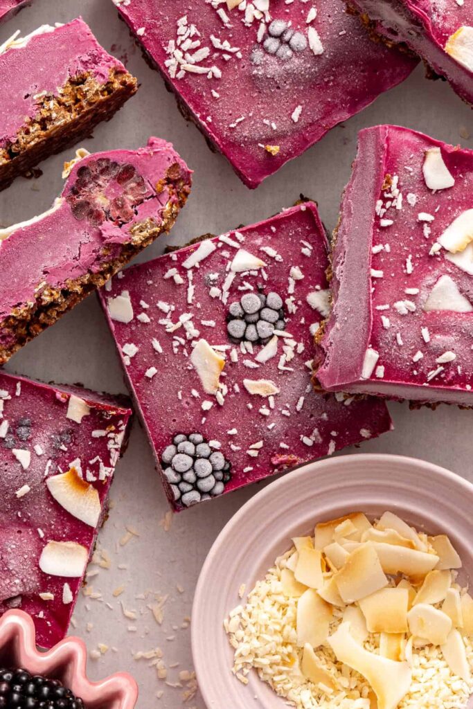 Top view of sliced blackberry cobbler bars showing layered texture