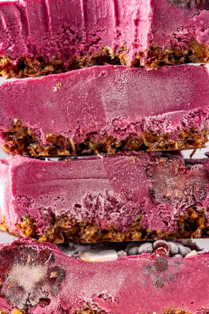 Close-up of blackberry cobbler bars layers with bite taken out