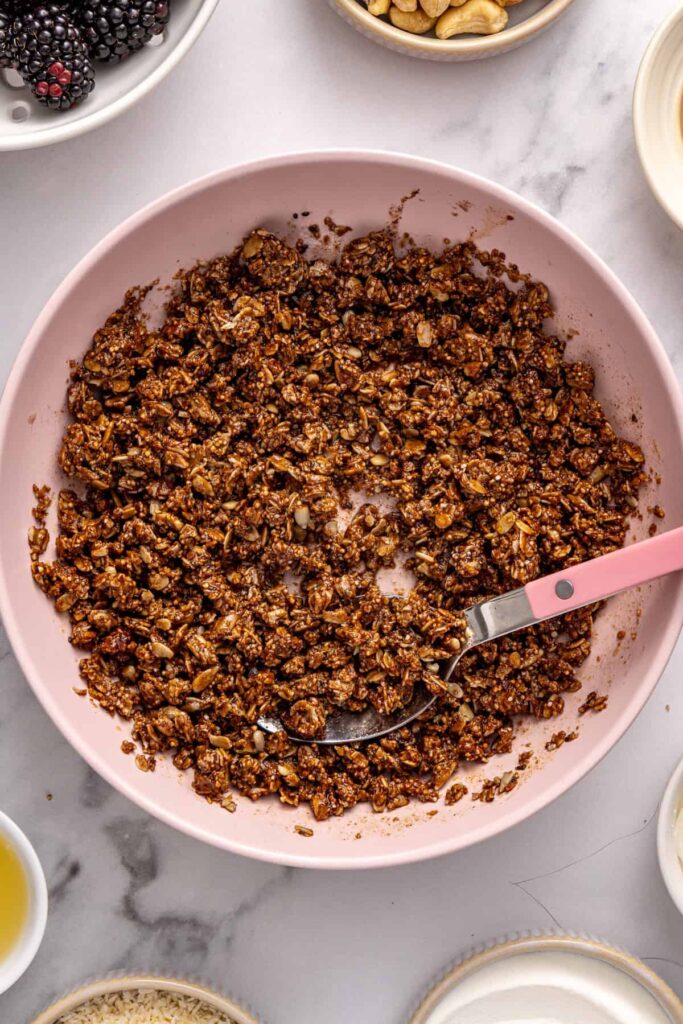 Mixing ingredients for healthy blackberry cobbler bars crust