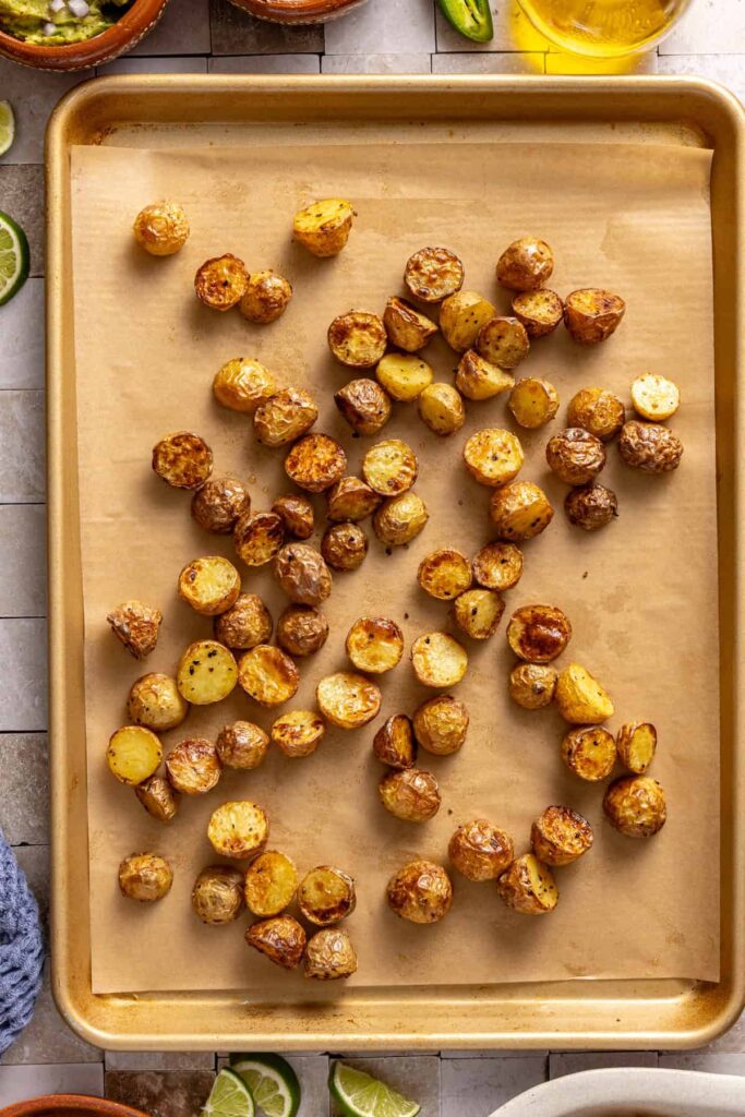 Roasted baby potatoes on baking sheet until crispy