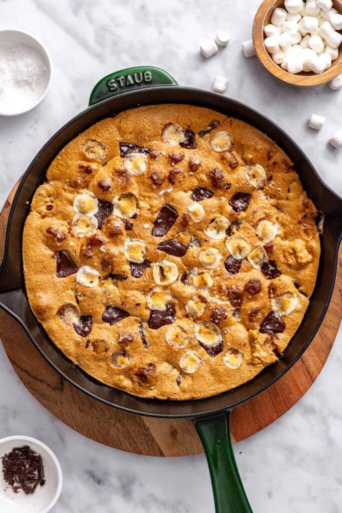 Freshly baked gluten-free s'mores cookie skillet in cast-iron skillet