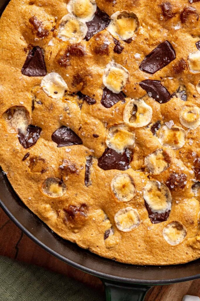 Homemade s'mores cookie skillet with toasted marshmallows and melted chocolate