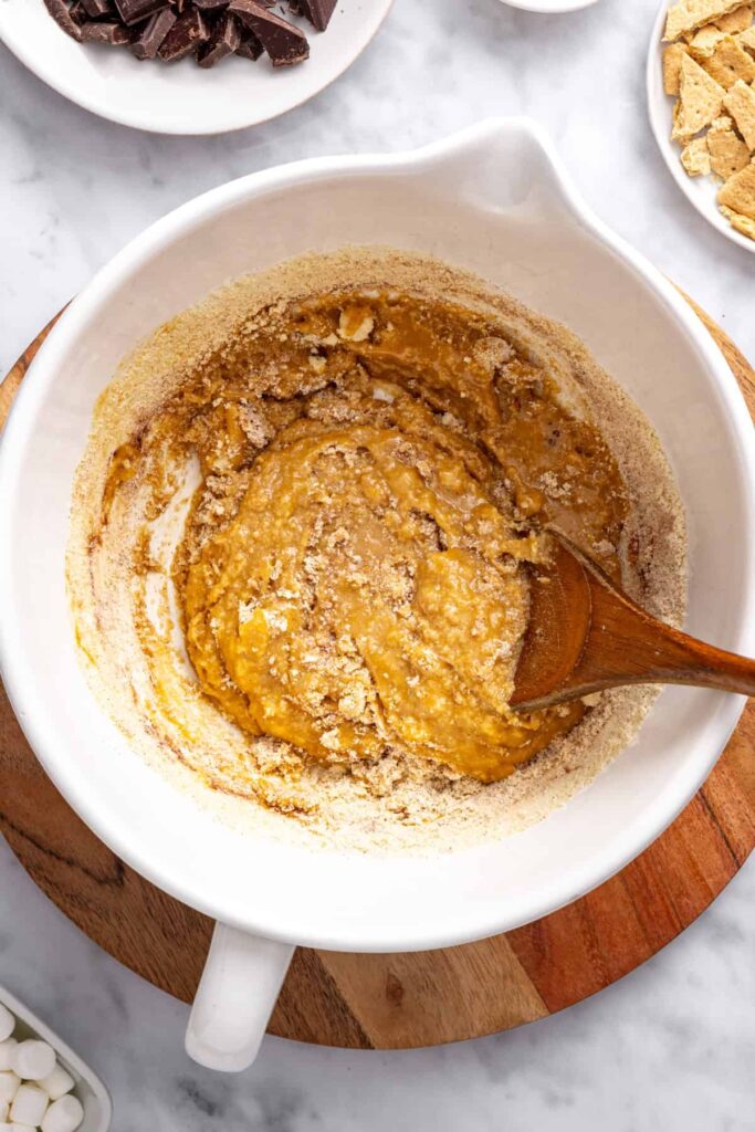 Mixing almond flour into s'mores cookie skillet dough