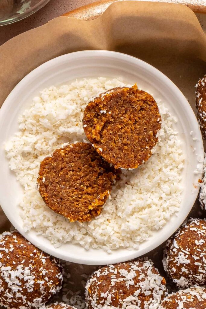 Rolling pumpkin protein ball mixture into bite-sized balls before chilling