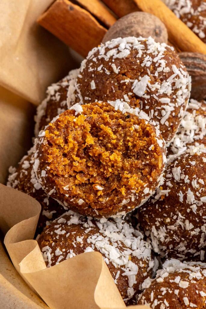 Close-up of no-bake pumpkin protein balls made with almond butter and pecans