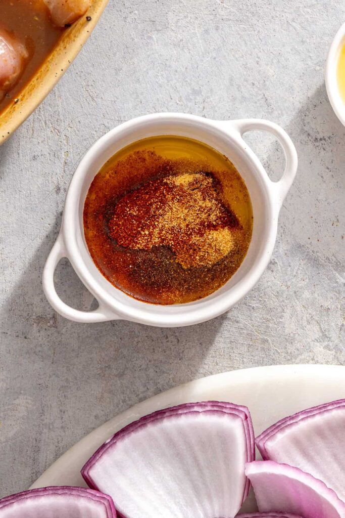 Melted ghee mixed with chili powder, garlic powder, cayenne, and salt