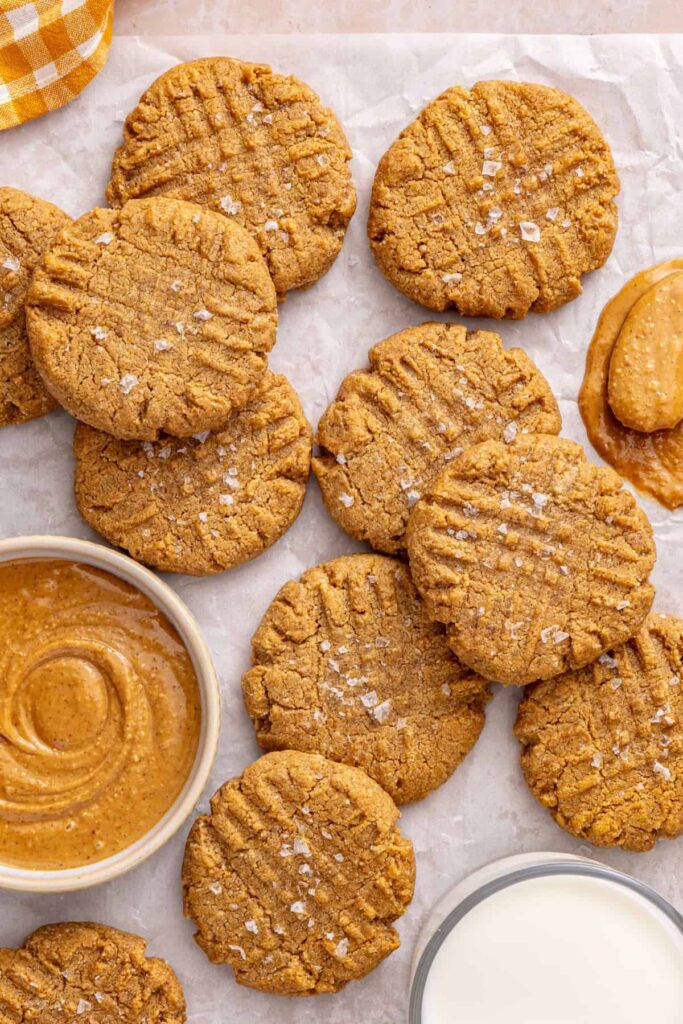 Homemade gluten-free peanut butter cookies arranged on a table for serving