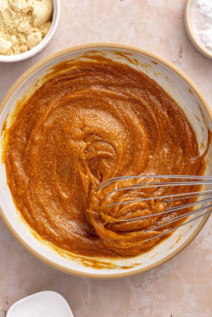 Peanut butter cookie batter base being whisked until smooth