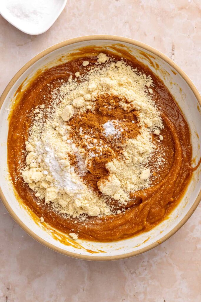 Almond flour, cinnamon and baking soda added to peanut butter cookie dough