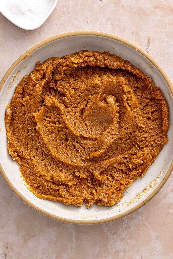 Cookie dough coming together for soft gluten-free peanut butter cookies