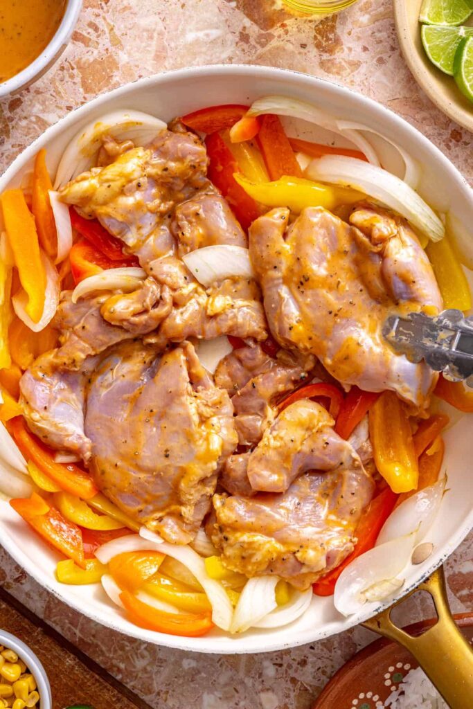 Cooking marinated chicken in southwest chicken skillet