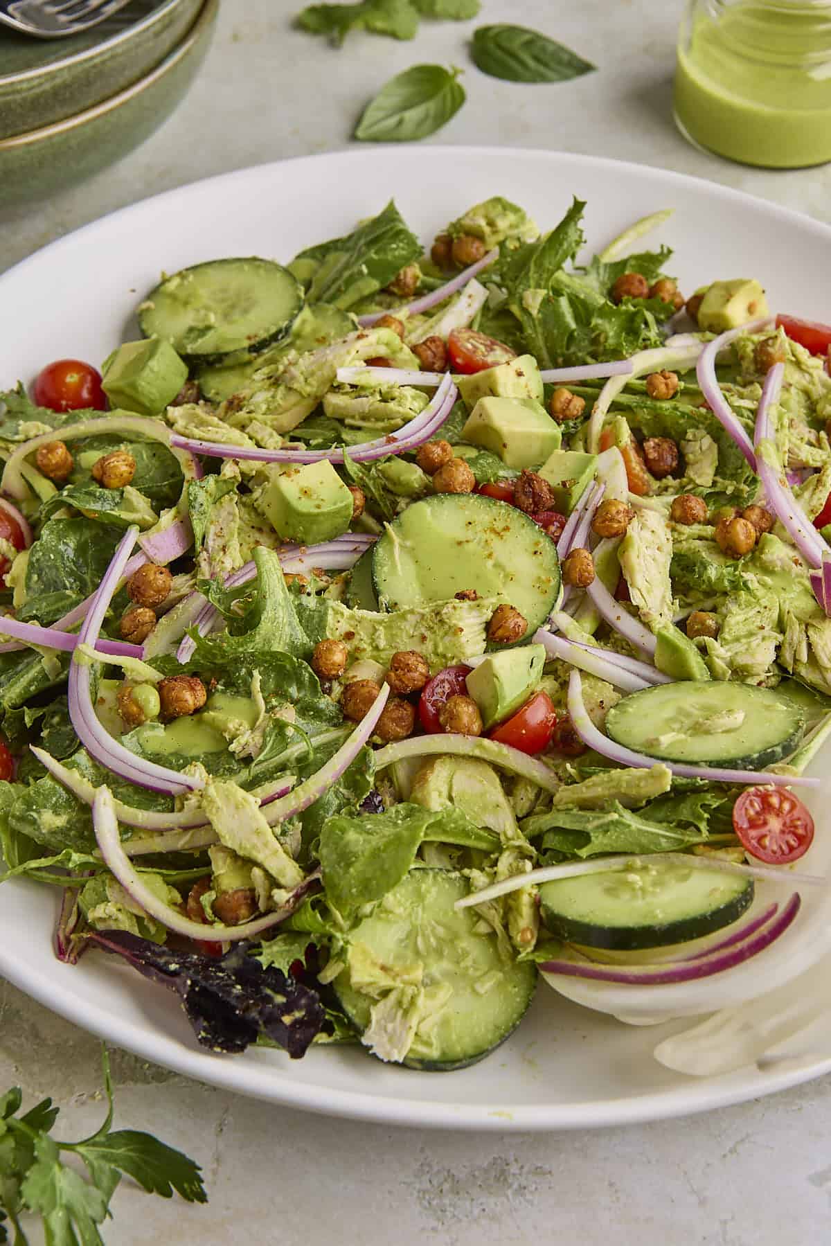 Green Goddess Chicken Salad with crispy chickpeas, avocado, and fresh herb dressing.