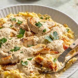 High-protein chicken alfredo served with spaghetti squash