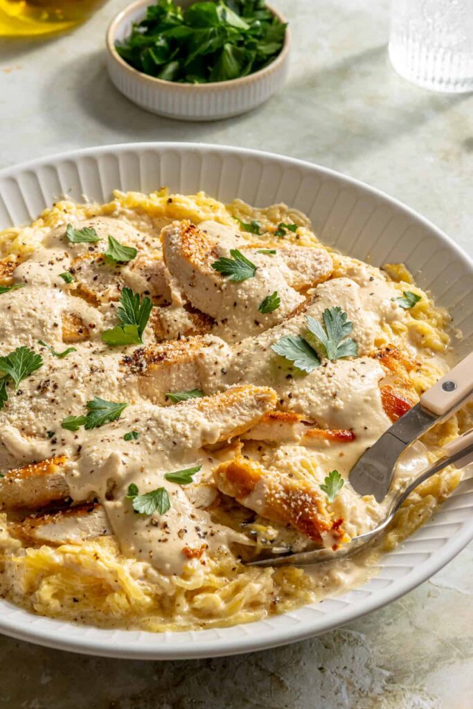 High-protein chicken alfredo served with spaghetti squash