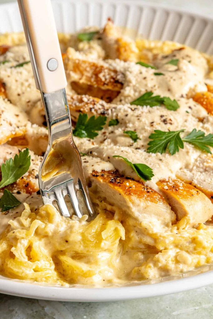 High-protein chicken alfredo served with spaghetti squash