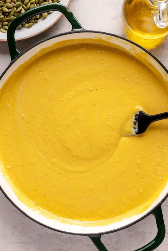 Kabocha cashew curry soup served with pumpkin seed topping – gluten-free, dairy-free recipe