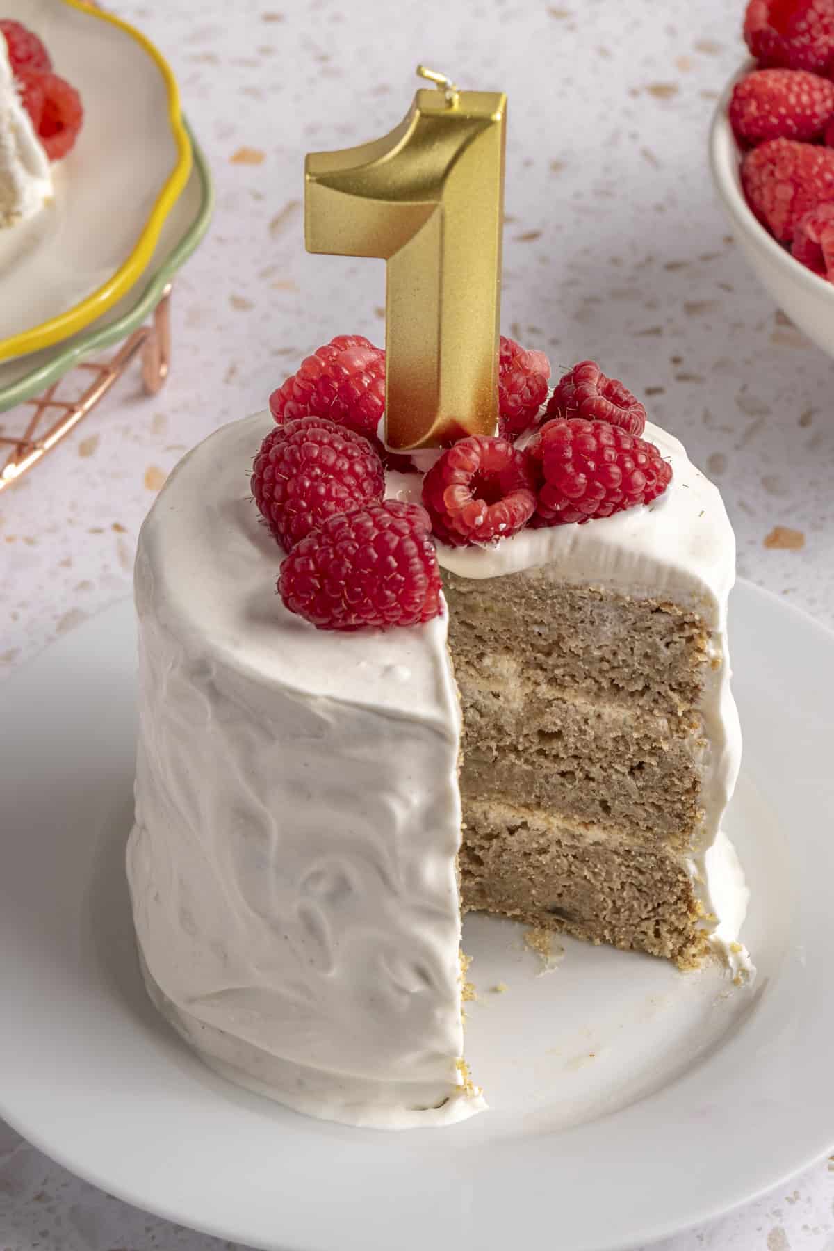 closeup shot of first birthday smash cake