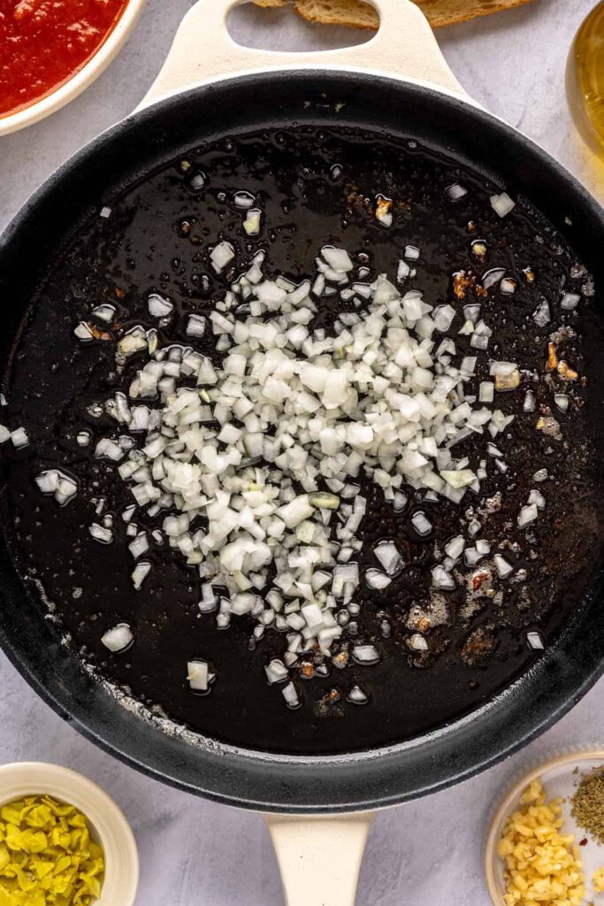 High-protein chicken pesto parmesan meatball subs with marinara sauce and melted cheese