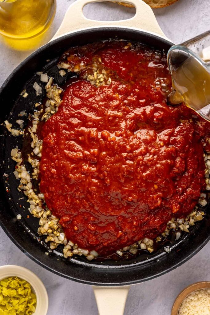 High-protein chicken pesto parmesan meatballs in marinara sauce