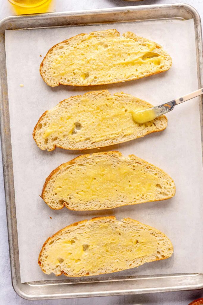 bread with ghee before toasting, for chicken pesto parmesan meatballs subs