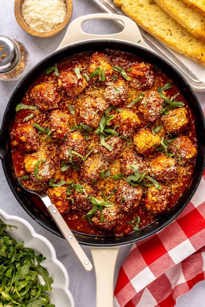 High-protein chicken pesto parmesan meatballs in marinara sauce