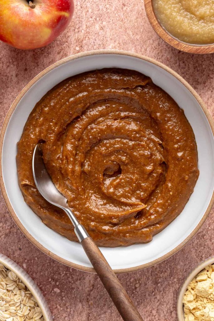 Smooth date caramel in a bowl for baked apple oatmeal