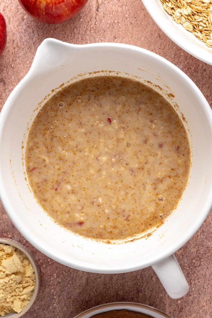 High-protein oatmeal batter for baked apple oatmeal in a bowl