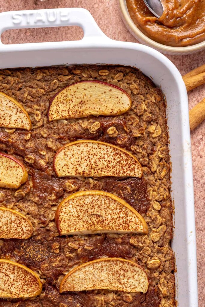 Golden baked apple oatmeal with cinnamon and caramel swirls