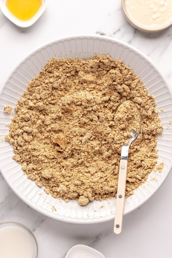 Forming gingerbread protein balls dough by combining wet and dry ingredients