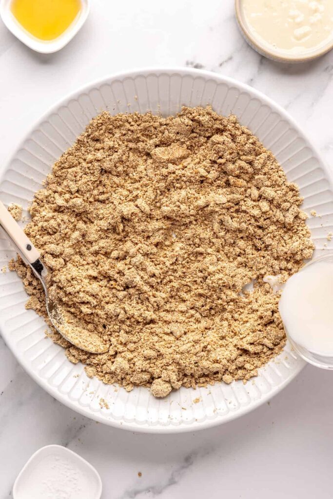 Forming gingerbread protein balls dough by combining wet and dry ingredients