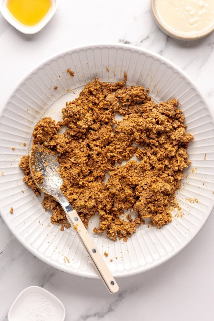 Forming gingerbread protein balls dough by combining wet and dry ingredients