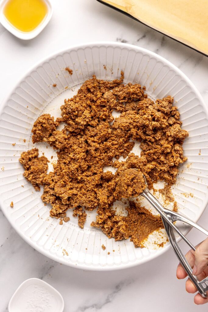 Forming gingerbread protein balls dough by combining wet and dry ingredients