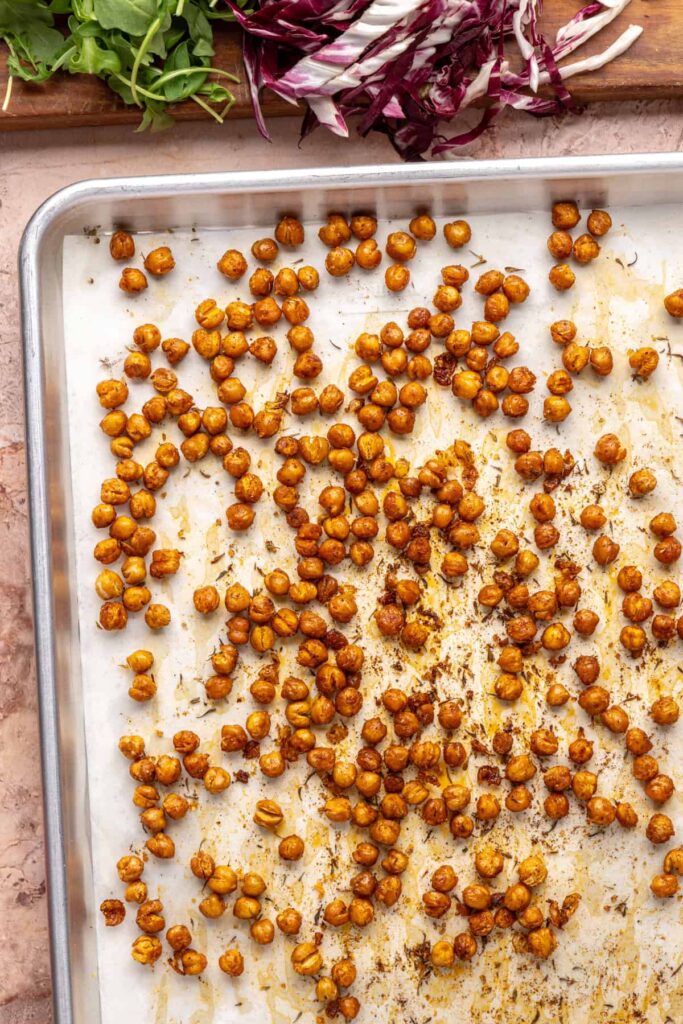 Crispy roasted chickpeas cooling before assembling harvest salad