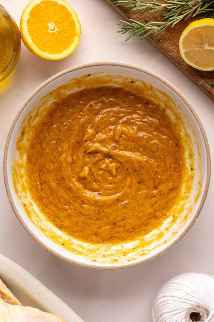 Maple-citrus glaze for Citrus Maple Chicken ready to baste the chicken during roasting