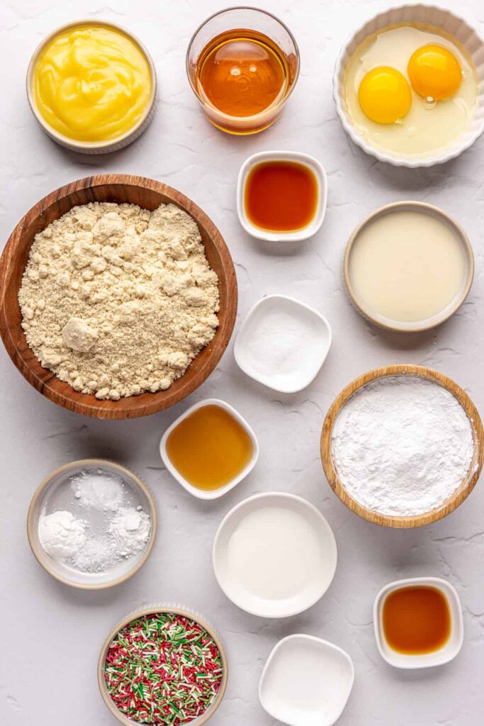 ingredients for Healthy Christmas sugar cookies made with almond flour and topped with festive frosting and sprinkles