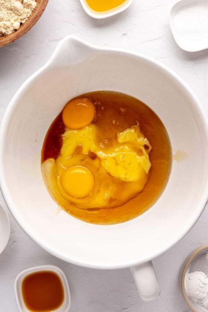 wet ingredients in a bowl for Christmas Sugar Cookies