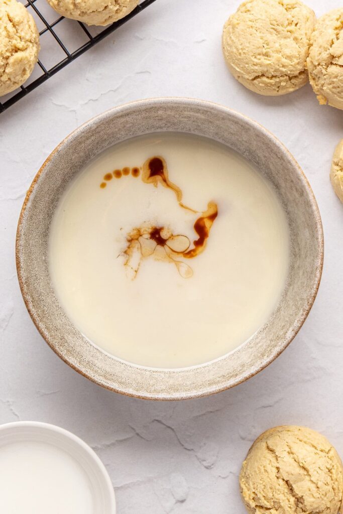 icing ingredients in a bowl for healthy Christmas Sugar Cookies