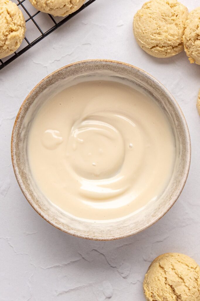 icing for healthy Christmas Sugar Cookies in a bowl