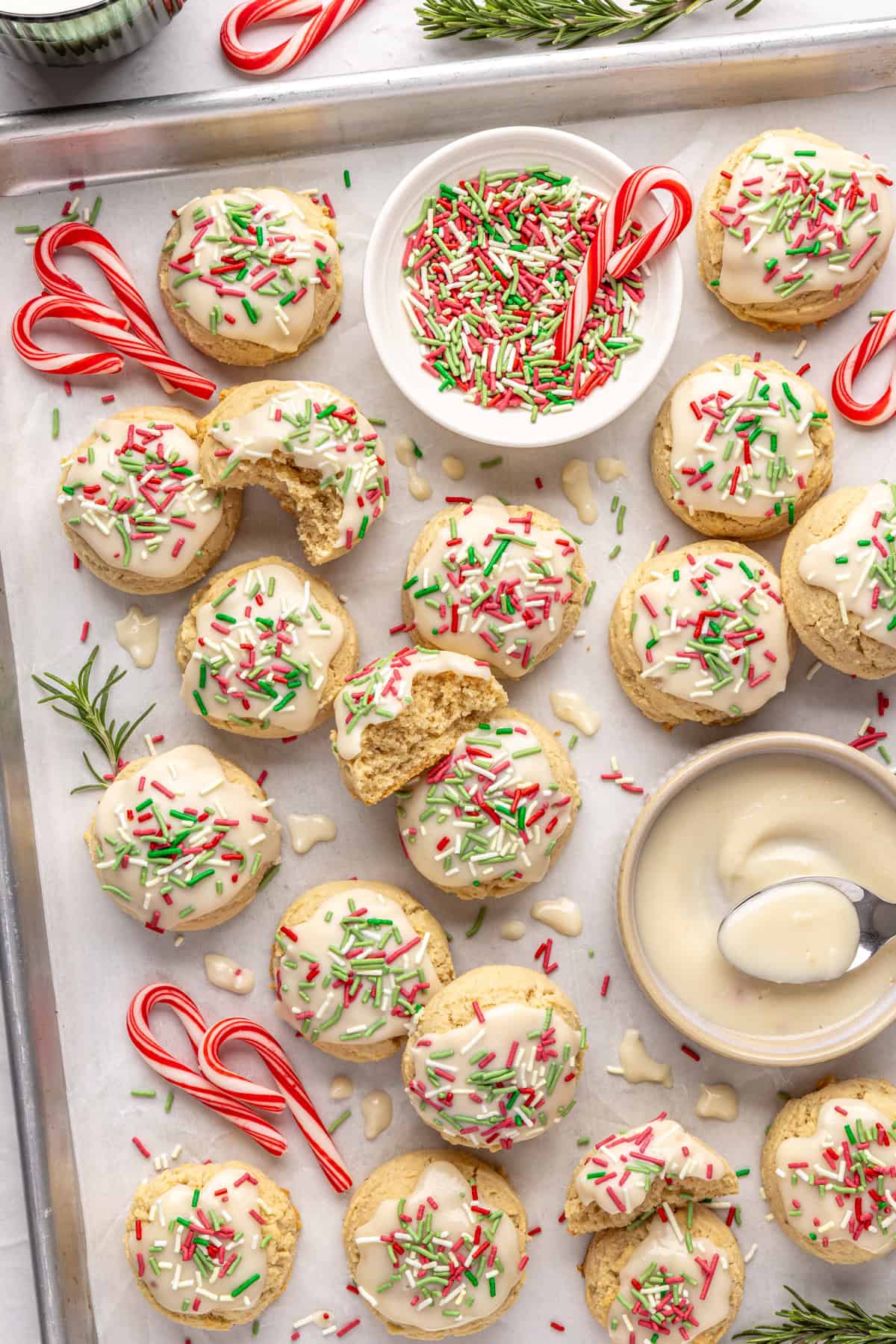 Healthy Christmas sugar cookies made with almond flour and topped with festive frosting and sprinkles