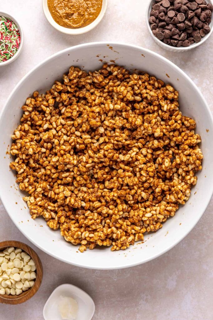 Fully mixed peanut butter mixture with brown rice cereal to make salted peanut butter bars base