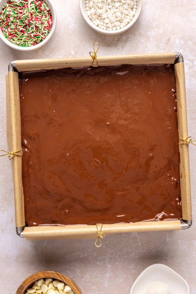 Salted peanut butter bars base ready to set in the freezer to harden.