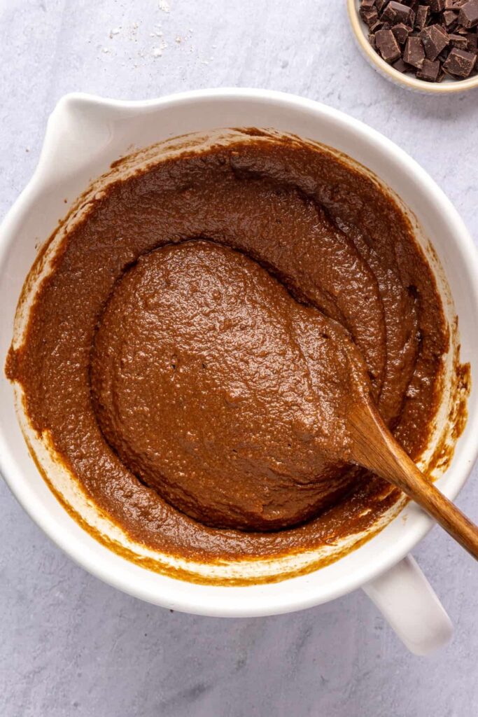 Smooth pumpkin spice chocolate loaf batter ready to pour into the loaf pan.