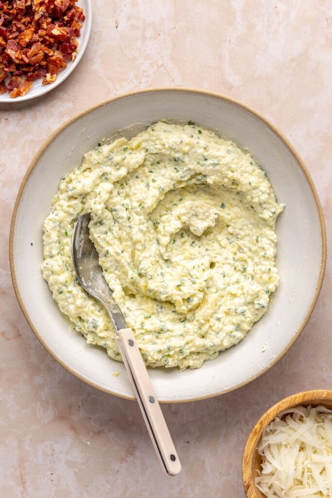 Smooth potato filling ready to be spooned into potato skins