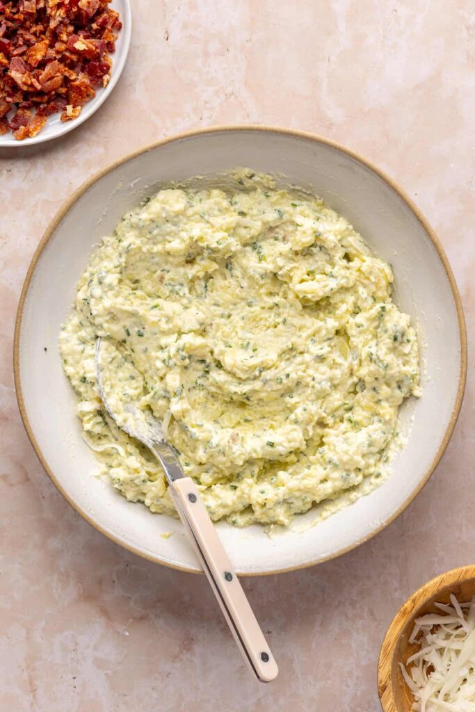 Smooth potato filling ready to be spooned into potato skins