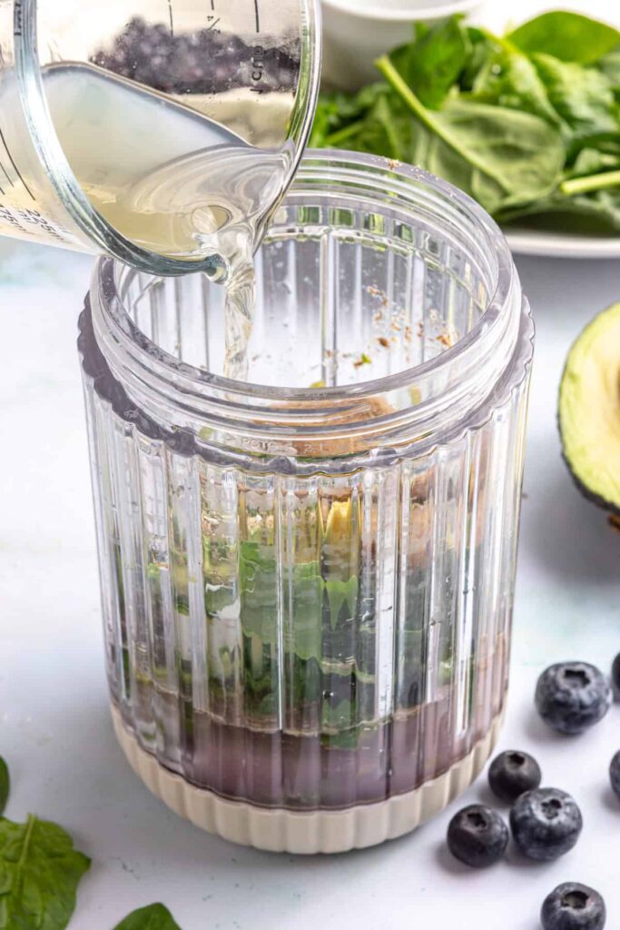 All ingredients for toddler smoothie in a Beast blender, ready to blend