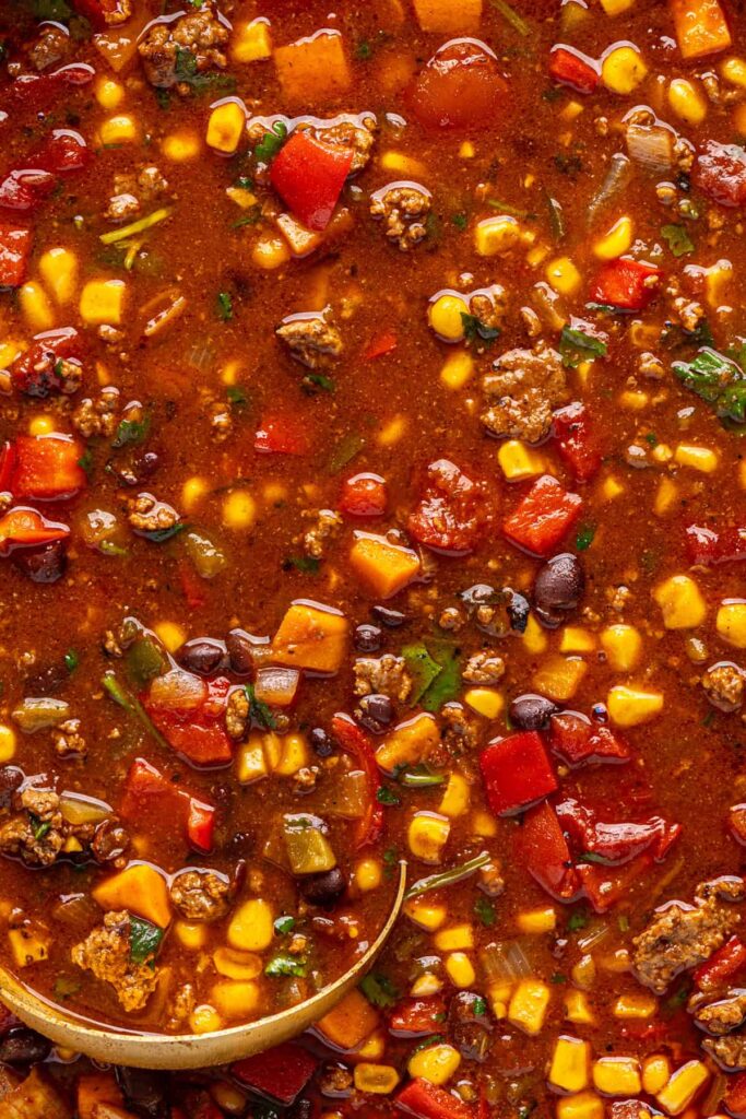 zoomed in shot of healthy, high-protein chipotle beef & black bean soup