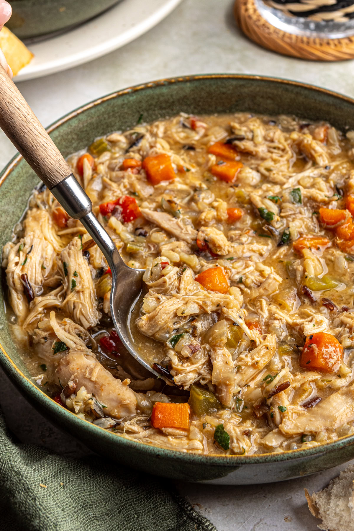 Creamy cajun chicken soup made with shredded chicken, wild rice, and vegetables