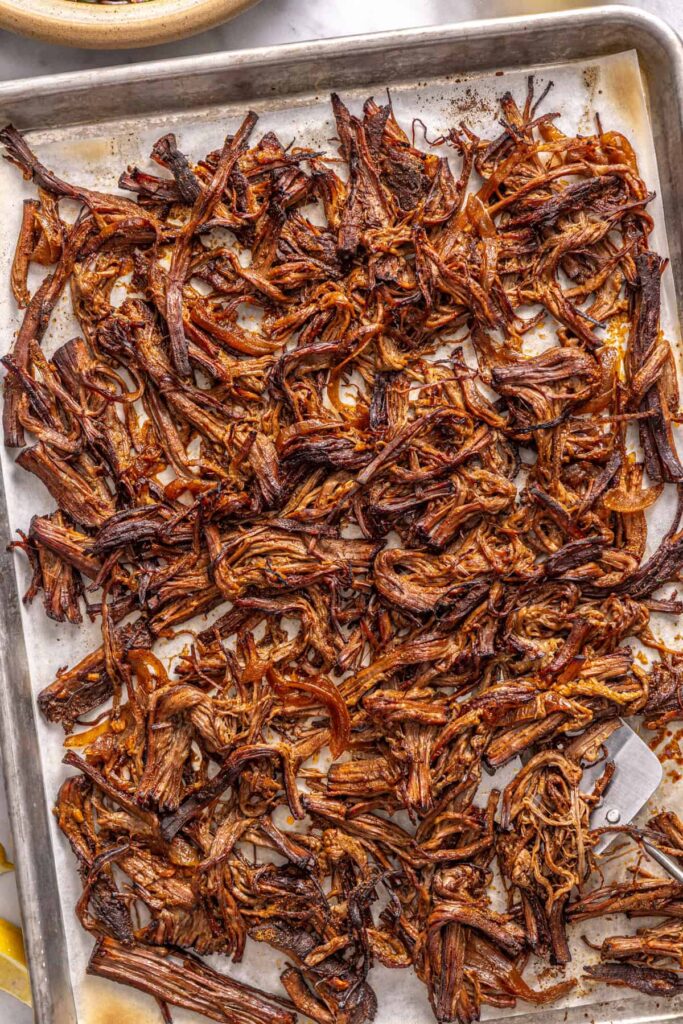 Crispy Greek beef after broiling for beef bowls
