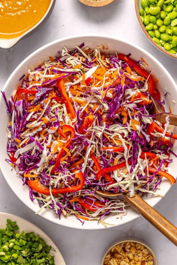 Fresh vegetables prepared for crunchy peanut cabbage salad