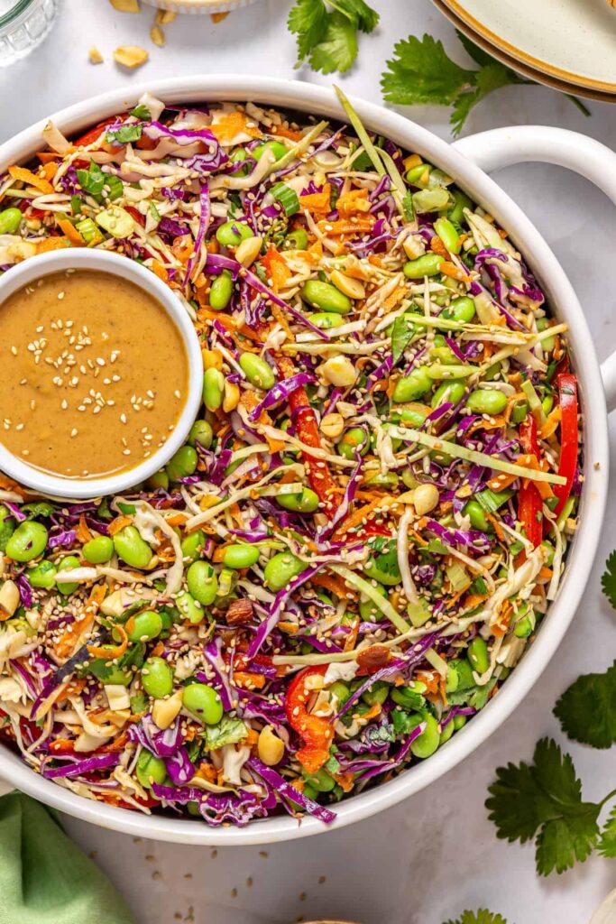 Texture shot of crunchy cabbage salad with creamy peanut dressing